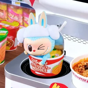 Labubu THE MONSTERS Cup Noodles figure in a fun kitchen setting.